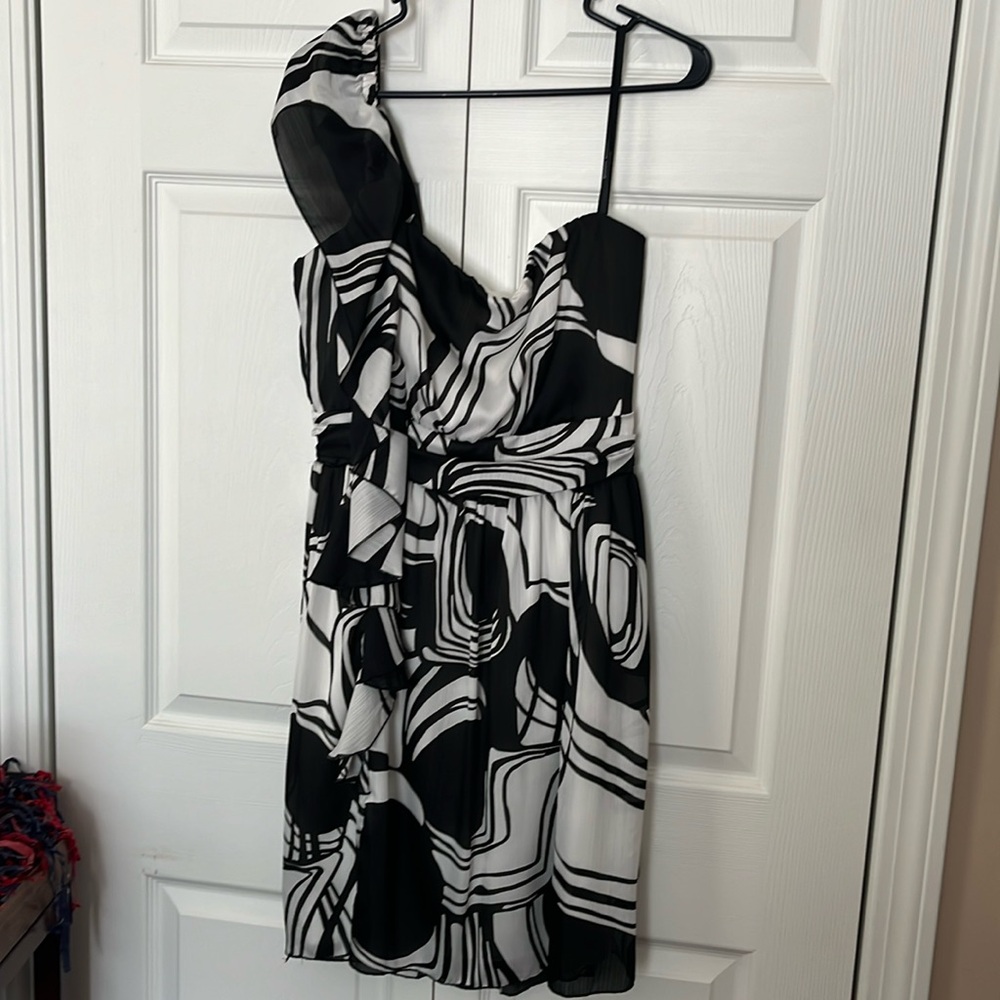 One shoulder black and white short dress.